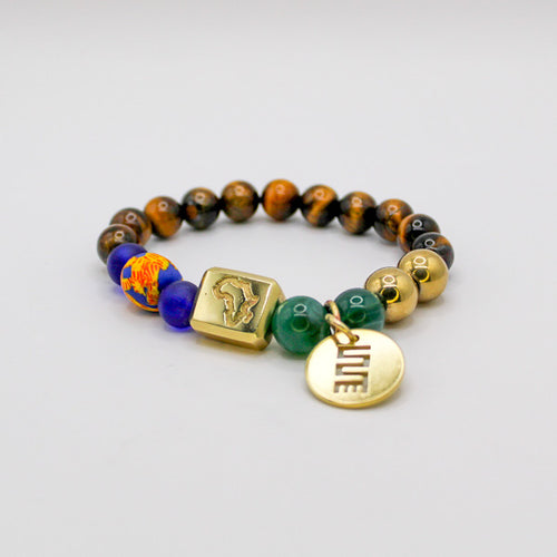GREEN Made In Africa beaded bracelet with tiger eye beads, gold hematite, green agates, recycled Ghana glass beads and NKYINKYIM Adinkra Symbol.