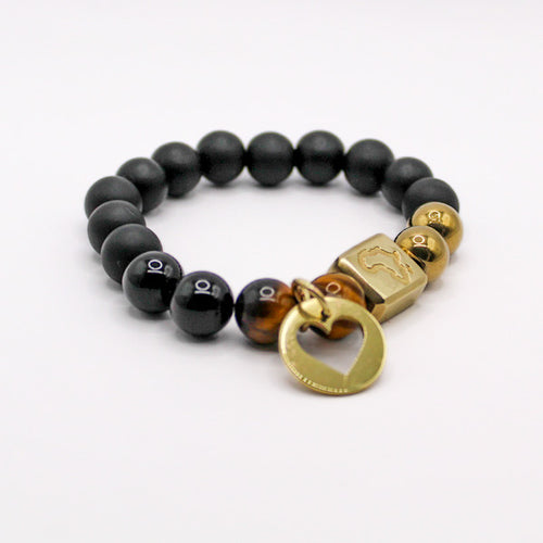 Male Black Owula Made In Africa Bracelet with Adinkra symbol AKOMA that represents heart and patience.